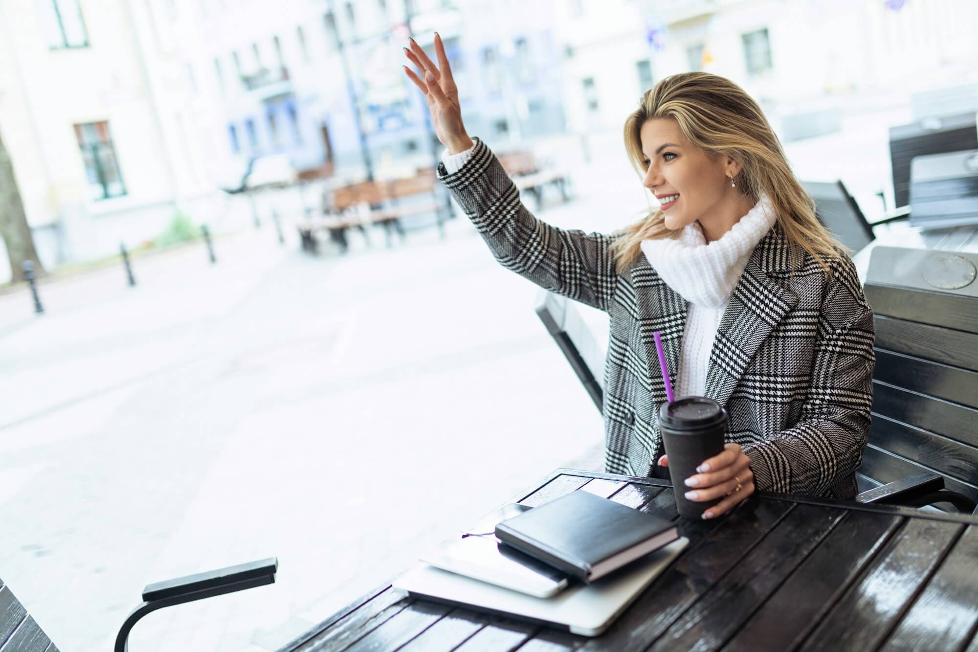 adult-female-hr-specialist-waiting-for-a-candidate-for-a-position-in-a-cafe-with-a-cup-of-coffee-and.jpg
